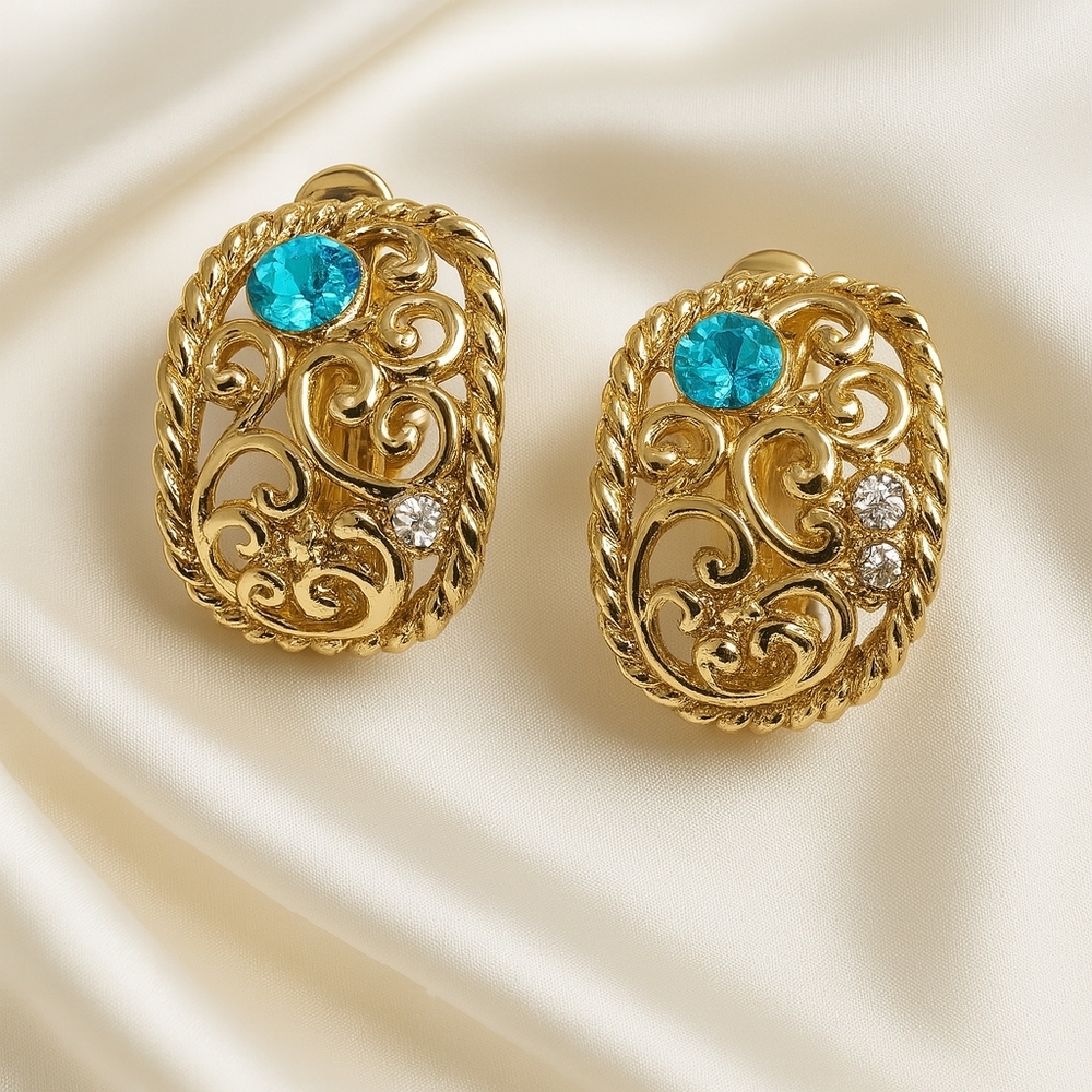 Regal Filigree Radiance: Jordache Gold-Tone Clip-On Earrings Sapphire Crystal